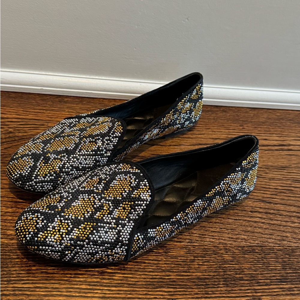 Women’s Brian Atwood gold and silver flat slip on loafers size 8.5